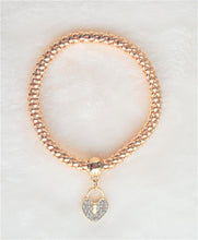 Load image into Gallery viewer, Gold Tone Stretch Metal Mesh Bracelet with Rhinestone Heart Charm - Urban Flair USA