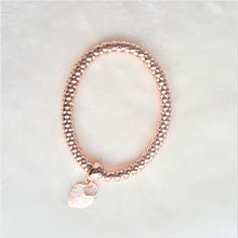 Load image into Gallery viewer, Rose Gold Tone Stretch Metal Mesh Bracelet with Rhinestone Heart Charm - Urban Flair USA